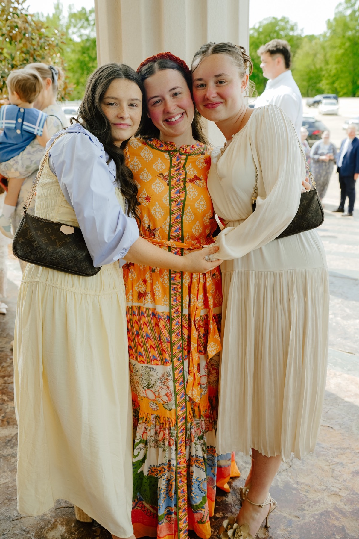 Friends smiling together outside PineGrove
